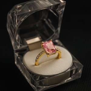 "Pink Gemstone Gold-Toned Ring in Clear Display Box."